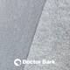 Nahaufnahme eines weichen grauen Stoffes mit strukturierter Oberfläche, mit dem Logo "Doctor Bark" und dem Text "MADE IN GERMANY."