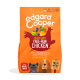 Edgard Cooper dog food bag featuring "Succulent Free-Run Chicken" on an orange background, with illustrations of fruits and vegetables.