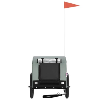 Tieranhänger in Grau mit einem schwarzen Stauraum, ausgestattet mit einer Sicherheitsflagge und einer Leinenbefestigung.