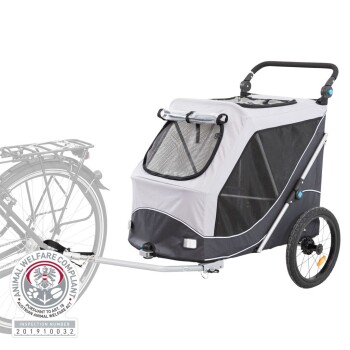 Ein Haustieranhänger in Grau und Schwarz, mit einem Netz vorne für Sichtbarkeit und Belüftung, am Fahrrad befestigt.