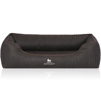 Ein stilvolles, dunkelgraues Hundebett mit einem gesteppten Design und braunem Paspel, mit dem 'KNUFFELWUFF'-Logo auf der Vorderseite.