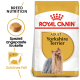 Royal Canin Adult Yorkshire Terrier Hundefutterbeutel mit einem Bild eines Yorkshire Terriers, mit Text, der die Rassenernährung und spezielle Kroketten hervorhebt.