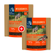Zwei Beutel Real Nature Wilderness Hundefutter mit der Aufschrift 'Green Coast', mit einem kleinen Hund auf der Vorderseite, mit 70% Fleischanteil und Garnelen.