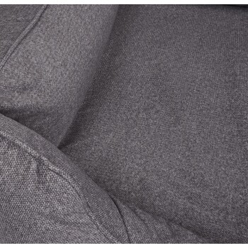 Nahaufnahme eines weichen, grauen Haustierbettes mit strukturiertem Stoff und plüschiger Polsterung, ideal für den Komfort von Haustieren.