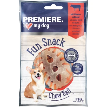 Kauball mit Rinderrohhaut 4 x 38g Ein fröhlicher Corgi sitzt neben einem Paket "Premiere I love my dog Fun Snack Chew Ball", das einen Rinderhaut-Leckerli mit Löchern zeigt.
