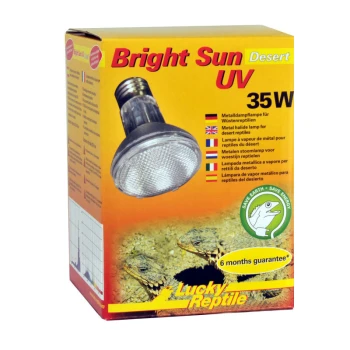 Bright Sun UV Desert 35 W Box mit "Bright Sun UV Desert" Lampe für Reptilien, mit einer 35W-Metallhalogenlampe, mit Bildern von Eidechsen und mehrsprachigem Text.