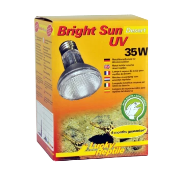 Box mit "Bright Sun UV Desert" Lampe für Reptilien, mit einer 35W-Metallhalogenlampe, mit Bildern von Eidechsen und mehrsprachigem Text.