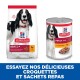 Produits alimentaires pour chiens de Hill's Science Plan, avec un chien souriant sur l'emballage, et un texte promouvant la nutrition pour chiens adultes.