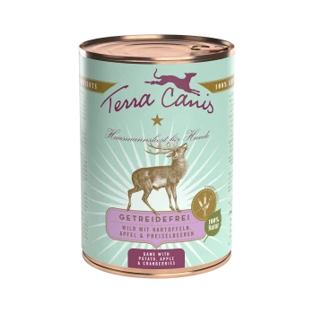 Eine Dose Terra Canis Hundefutter mit einer Hirschillustration, beschriftet mit "Getreidefrei" und "Wild mit Kartoffeln, Apfel & Preiselbeeren."