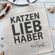 Beige Tragetasche mit fettem schwarzen Text: "KATZEN LIEB HABER," "www.i-love-my-cat.com," und einem Katzenlogo für natürliches Katzenfutter.