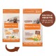 Deux sacs d'alimentation Nature's Variety pour chiens (Adult Medium/Maxi) étiquetés 'Deboned Meat with Chicken', 'No Grain' et badge rond 'Nouvelle recette — Même goût et qualité'.