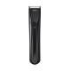 Tondeuse pour animaux Wahl noire avec bouton d'alimentation et lames métalliques sur le dessus.