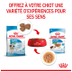 Image de nourriture pour chiots Royal Canin : un sac de croquettes, un bol rouge de croquettes, et un sachet de nourriture humide avec du texte sur les expériences sensorielles pour les chiots.