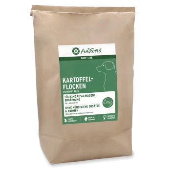 Braune Papiertüte mit BARF-Kartoffelflocken für Hunde, grünes AniForte-Etikett mit Hundeumriss und ‚Kartoffel-Flocken‘.