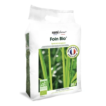 Foin biologique pour petits animaux, sac de 20L, étiqueté "Foin Bio* Spécial rongeurs," présentant de l'herbe verte avec des gouttes d'eau.