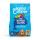 Dog food bag featuring "Edgard Cooper Yummy Norwegian Salmon" with colorful fruits, stating it's a grain-free recipe for adult dogs.