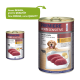 Dosen-Hundefutter mit der Aufschrift 'Premiere Meati Sensitive', das Rindfleisch und Kartoffeln enthält, mit einem Hundebild und Text in mehreren Sprachen.