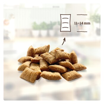 Haufen brauner, kissenförmiger Heimtier-Krokette mit Pfeil zu einer Grafik und der Angabe '11–14 mm' zur Größe.