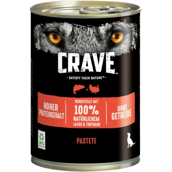 Dosen-Tiernahrung mit der Aufschrift "CRAVE" und dem Gesicht eines Wolfes, das einen hohen Proteingehalt hervorhebt, hergestellt aus 100% natürlichem Lachs und Truthahn, getreidefrei.