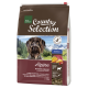 Hundefuttertüte mit der Aufschrift "Real Nature Country Selection Alpine" mit Puten-, Alpenrind-, Emmentaler Käse- und Kürbisinhalten.