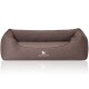 Braunes Hundebett mit erhöhten Seiten und einem weichen Kissen, mit dem Logo "KNUFFELWUFF" auf der Vorderseite gestickt.