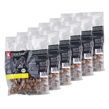 Sechs durchsichtige Plastikbeutel mit braunen Leckerlis, beschriftet „LIEBESGUT“, „150 g“ sichtbar.