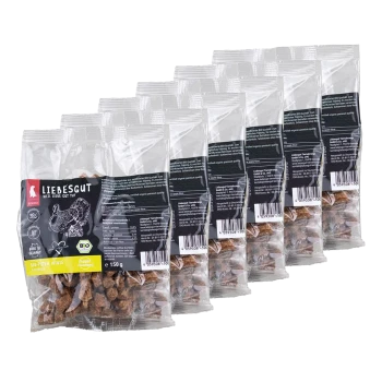 Sechs durchsichtige Plastikbeutel mit braunen Leckerlis, beschriftet „LIEBESGUT“, „150 g“ sichtbar.