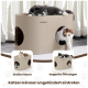 Beige PetRhein Katzenhöhle im sonnendurchfluteten Wohnzimmer; graue Katze schläft oben, eine dreifarbige Katze lugt von innen hervor, Sofa und Gartenblick im Hintergrund.