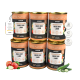 Sechs Dosen Alphazoo Angus Rind- und Lamm-Hundefutter mit Äpfeln und Zucchini, gekennzeichnet als getreidefrei und mit hohem Fleischanteil.