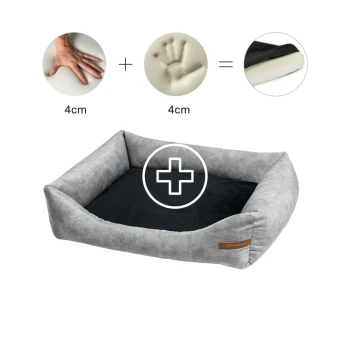 Graues Haustierbett mit einem schwarzen Kissen, das einen Handabdruck und ein Pluszeichen zeigt, das Komfort mit einer Dicke von 4 cm veranschaulicht.