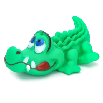 Grünes Hundespielzeug im Cartoon-Stil in Form eines Alligators mit großen blauen Augen und weißen Zähnen auf weißem Hintergrund.