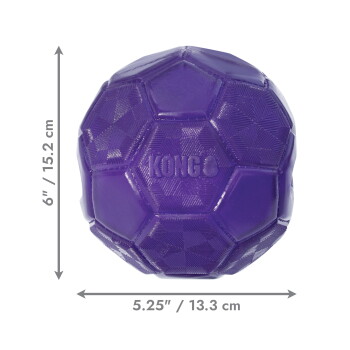 Balle KONG en caoutchouc texturé violette, panneaux hexagonaux ; flèches indiquant 6\" (15,2 cm) × 5,25\" (13,3 cm) sur fond noir.