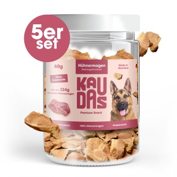 Hundeleckerlis in einem klaren Glas mit dem Etikett "KAUDAS" und einem Bild eines schwarzen Hundes, mit den Texten "Hühnermagen" und "Training & Belohnung".
