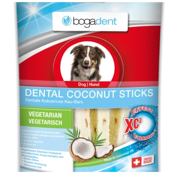 Emballage de bâtonnets dentaires à la noix de coco pour chiens mettant en avant un chien souriant, avec un texte soulignant "Végétarien," "Bâtonnets dentaires à la noix de coco," et "Fabriqué en Suisse."