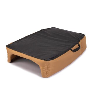 Ein rechteckiges Haustierbett mit schwarzem Oberteil und beigen Seiten, ausgestattet mit einem Griff für einfachen Transport.