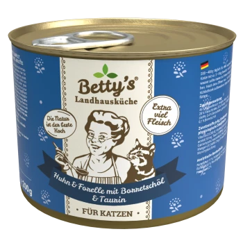 Dosenkatzenfutter "Betty's Landhausküche" zeigt eine Frau, die mit einer Katze kocht. Text: "Huhn & Forelle mit Borretschöl & Taurin," "Extra viel Fleisch."