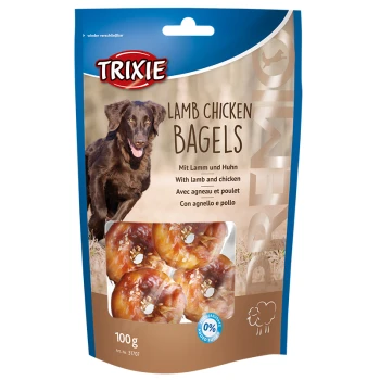 Premio Lamb Chicken Bagels 2x100g Trixie Lamm-Hühnchen Bagels Tierleckerlis Verpackung mit einem schwarzen Hund, mit Text in mehreren Sprachen und einem Foto der Bagels.