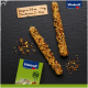 Two seed sticks for small pets, approximately 15 cm long and 2-3 cm wide, with a box labeled "Vitakraft" in green and a small animal image.