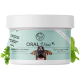 Behälter mit "ORAL Vital XL" Hundezahnpflegepräparat, mit dem Gesicht eines Hundes auf dem Etikett, mit Minzblättern daneben.