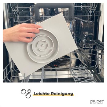 Eine Hand hält ein graues Haustierzubehör in einer Geschirrspülmaschine, mit dem Text "Leichte Reinigung" am unteren Ende.