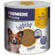 Un pot de poudre de garniture pour chiens Premiere avec un chien souriant sur le devant. L'étiquette indique "Foie de poulet avec noix de coco" et "100g."