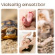 Collage unter dem Text „Vielseitig einsetzbar“: Nahaufnahme einer Schildkröte, Babyfüße, Küken im Korb, Frau bei einer Kopfmassage