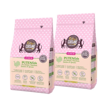 Dwa różowe opakowania karmy dla kota Kitty's Cuisine Junior z indykiem, rokitnikiem i spiruliną, 71% mięsa z indyka.