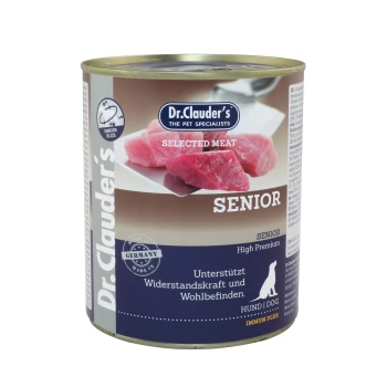 Dosenhundefutter von Dr. Clauder's, beschriftet mit "Senior," mit ausgewähltem Fleisch, mit einem Hinweis zur Unterstützung der Immunität und des Wohlbefindens.