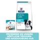 Hills Prescription Diet Dental Care t/d Hundefutterbeutel und Kaubonbons-Packung mit einem lächelnden schwarz-weißen Hund, der schmackhafte Optionen bewirbt.