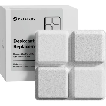 PETLIBRO-Trockenmittel-Ersatzbox und vier weiße quadratische Trockenmittelblöcke, Verpackungstext 'Desiccant Replacement' sichtbar.