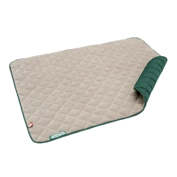 Eine beige Haustiermatte mit einem diamantgeprägten Muster, mit einem grünen Rand und einer gefalteten Ecke, beschriftet mit 'Doctor Bark'.