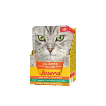 Josera Katzenpâté‑Packung mit großem grauem Katzenkopf und grünen Augen; sichtbarer Text ‚PATÉ‘ und ‚HUHN MIT SPINAT‘.