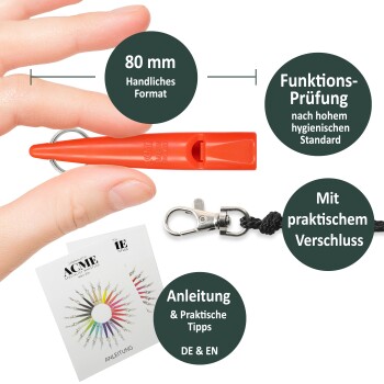 Hand hält eine 80mm orangefarbene ACME-Pfeife mit Schlüsselring, Lanyard-Clip und zweisprachiger Bedienungsanleitung, deutscher Text.