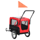Roter Haustieranhänger mit Netzfenstern, schwarzem Boden und einer orangefarbenen Sicherheitsflagge, entworfen für den Transport von Haustieren.